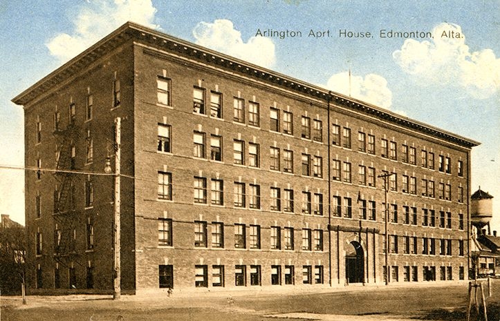 Exterior view of Arlington Apartments, captured in a historical photograph.