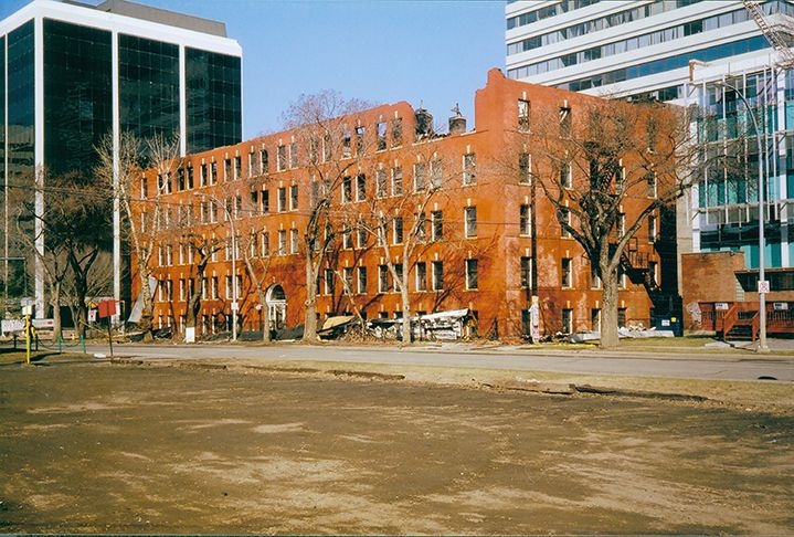 Exterior view of the ruins of Arlington Apartments.