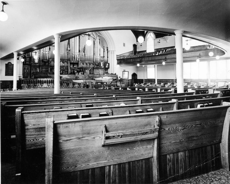 Interior view of the First Presbyterian Church in 1964. The image captures architectural details.