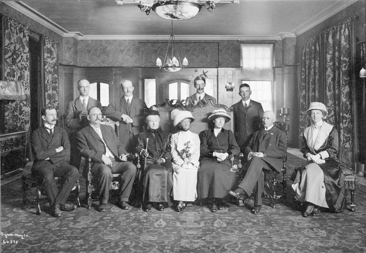 Government House officials gathered for a photograph outside the Government House in Edmonton.