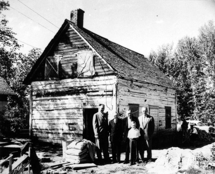 John Walter and Family in front of the first John Walter House, 1958.