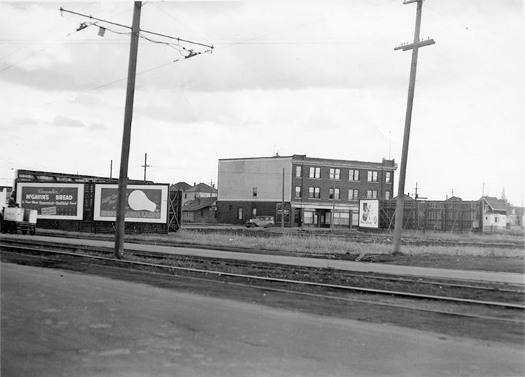 Photograph of the Lambton Block located at 111 Avenue and 97 Street in Edmonton, captured from the west in 1930.