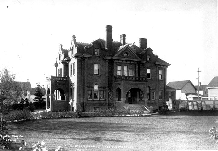 Exterior view of McDougall Mansion in Edmonton, showcasing its architectural features.
