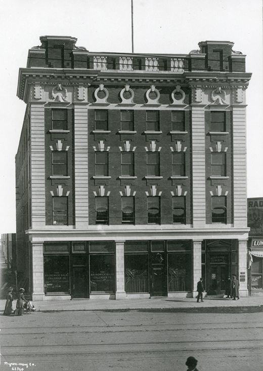 Photograph of the Moser and Ryder Block, taken in 1911, showcasing its exterior.