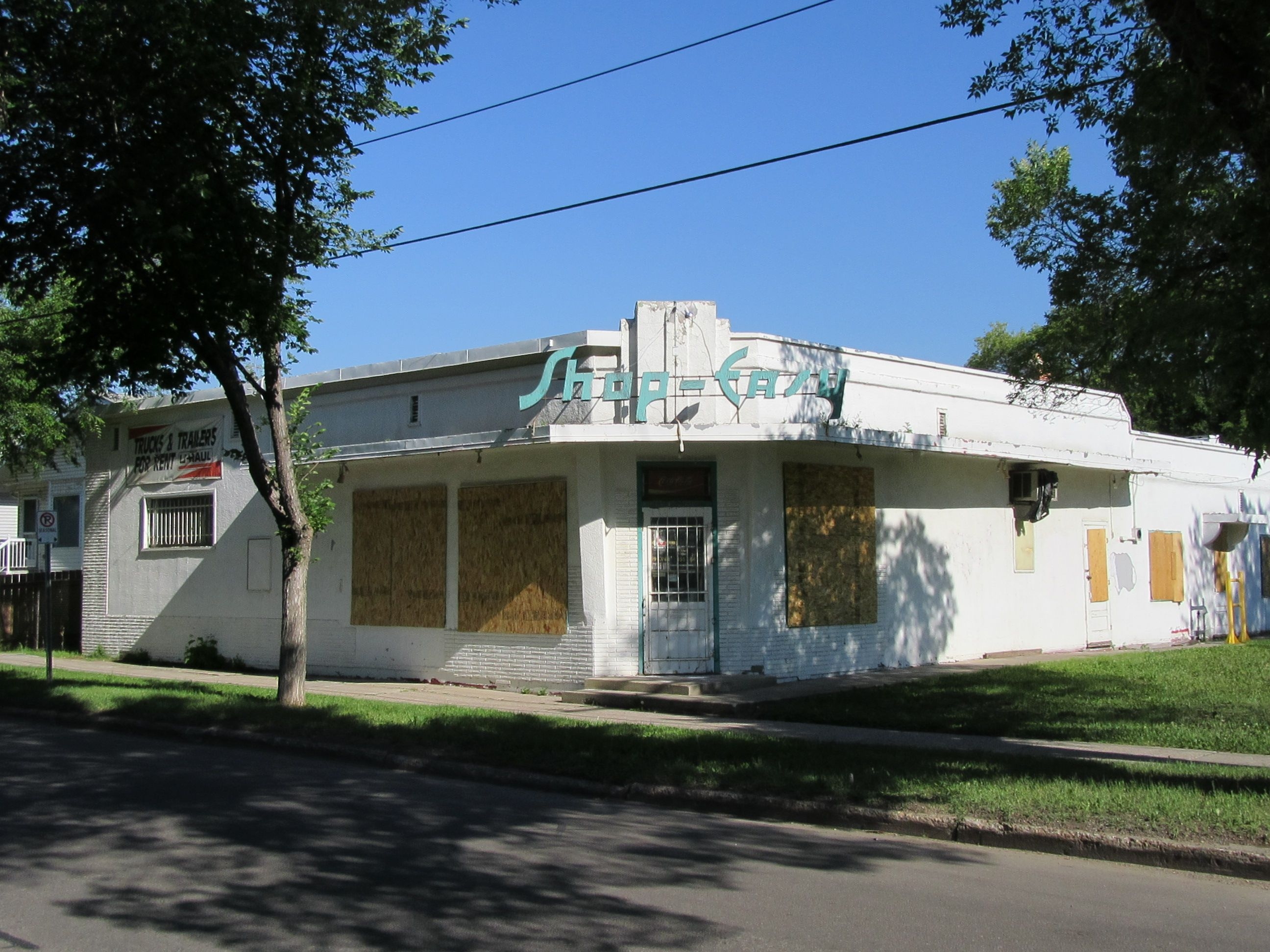 Shop-Easy, an exterior view of a retail store.