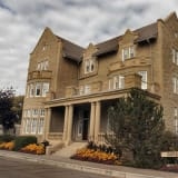 Front view of Government House taken in 2007, showing the architectural details of the building.