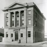 Exterior view of the Merchants Bank of Canada, circa 1909.