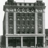 Photograph of the Moser and Ryder Block, taken in 1911, showcasing its exterior.