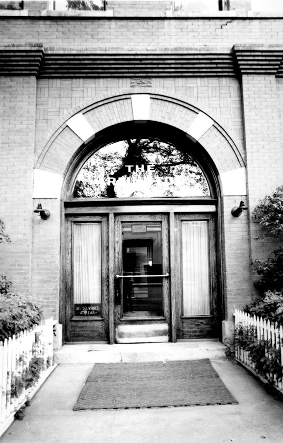 Exterior view of the entrance to Arlington Apartments.