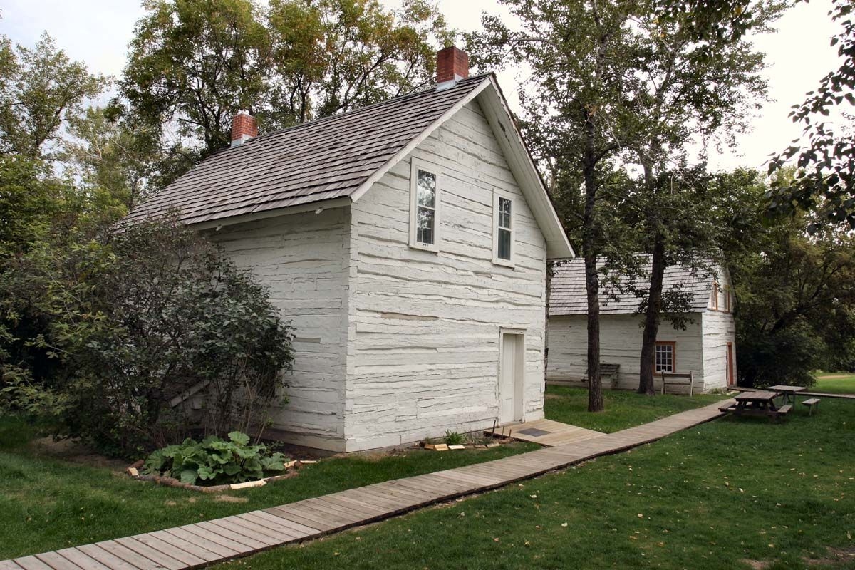 John Walter Museum, 2007, second house in foreground, the first in the back. Photo by Lawrence Herzog. Courtesy of COE Sustainable Development.