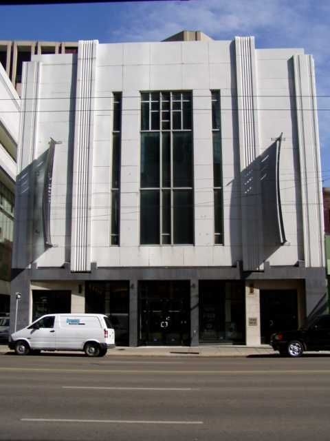 Exterior view of Moser and Ryder Block, showcasing its architectural features.