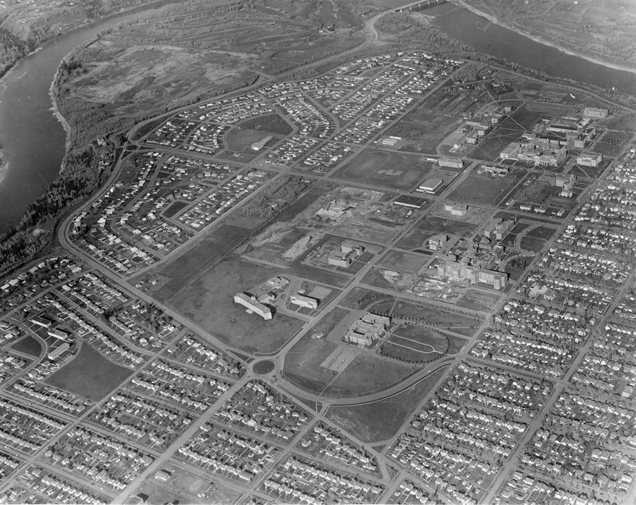 Aerial view of the University of Alberta, circa 1950, showcasing the campus layout and surrounding areas.